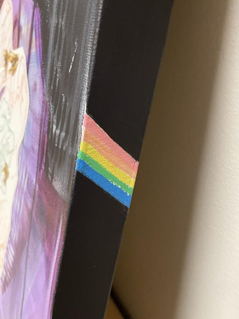 A view of the design on the side of the Hands canvas